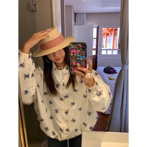 落落狷介宽松印花防晒服女