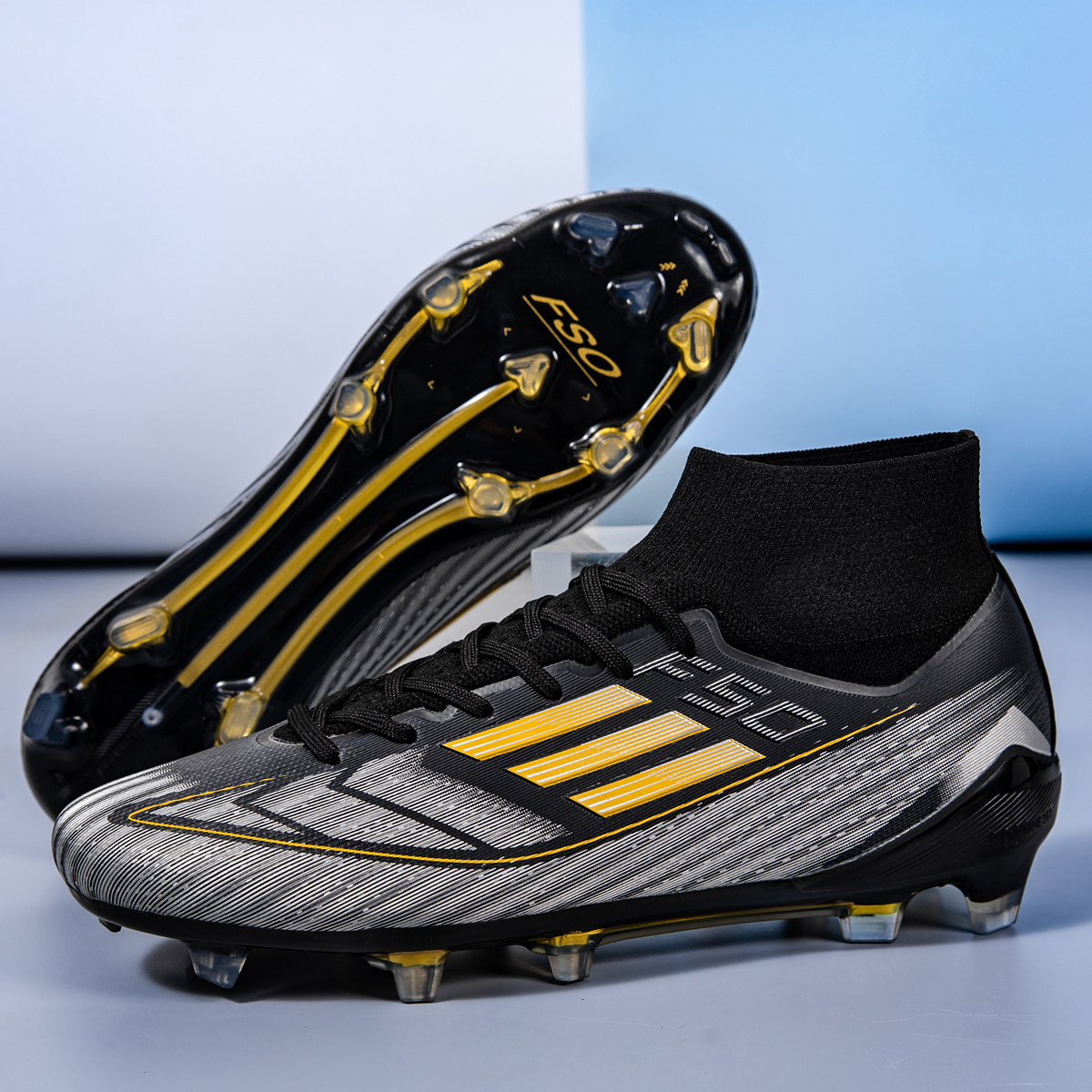 C罗梅西足球鞋长钉AG碎钉高帮训练专业男孩女儿童防滑学生比赛鞋