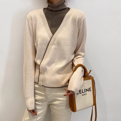 Autumn and winter color matching high collar woolen sweater women's wool fake two pieces of curled edge foreign style knitted bottomed sweater