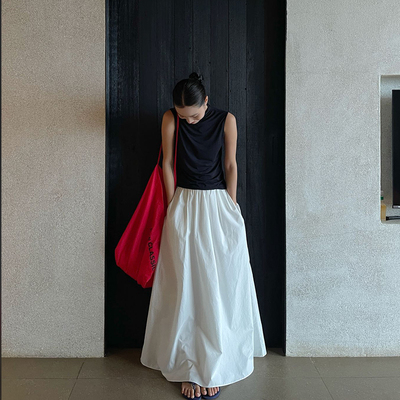 PURITY YH小众简约白色设计感前松紧腰大摆裙气质宽松显瘦半身裙