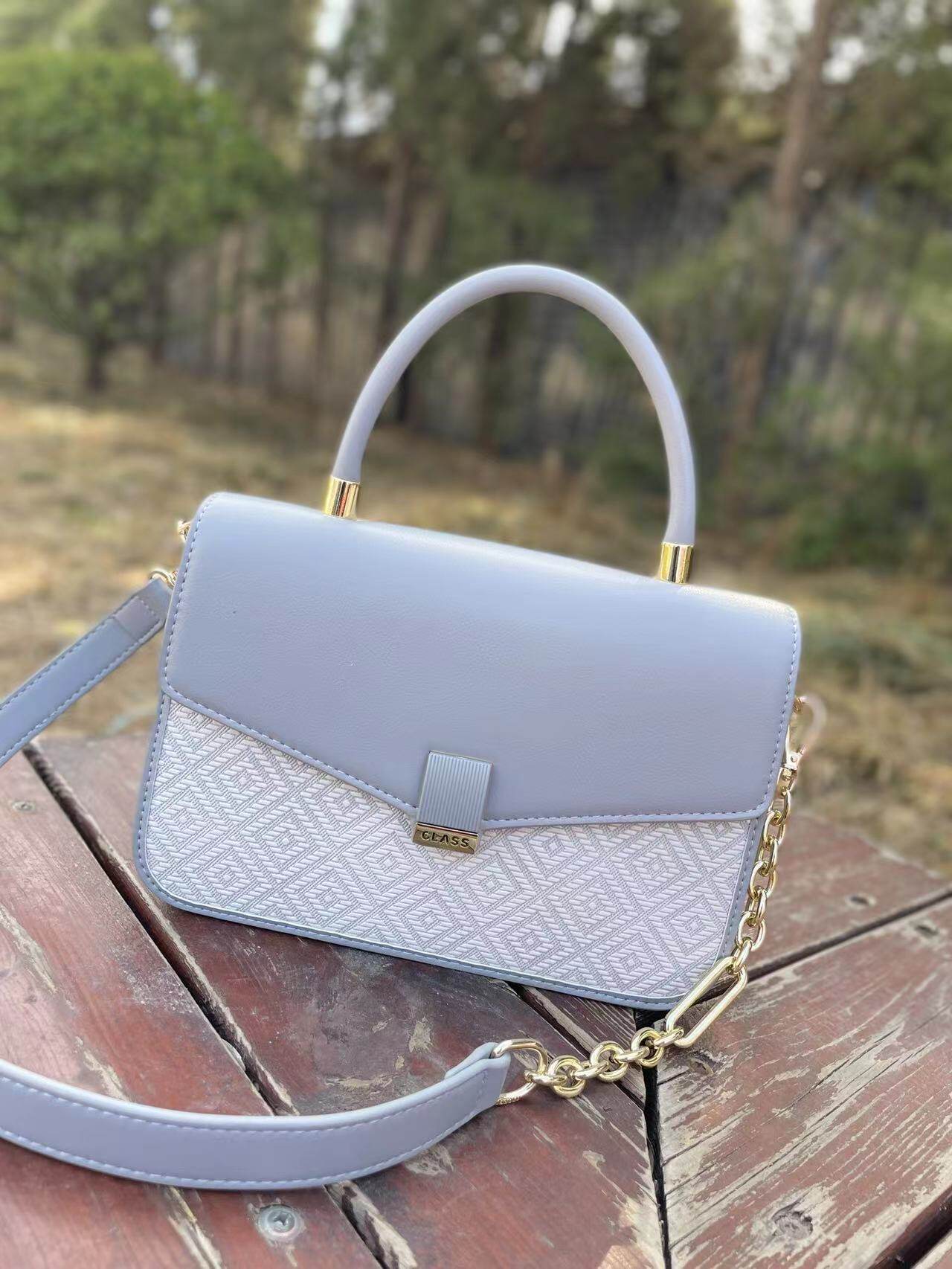 新款都宝路复古百搭简约锁扣拼色法棍包包女2026新款单肩斜挎包