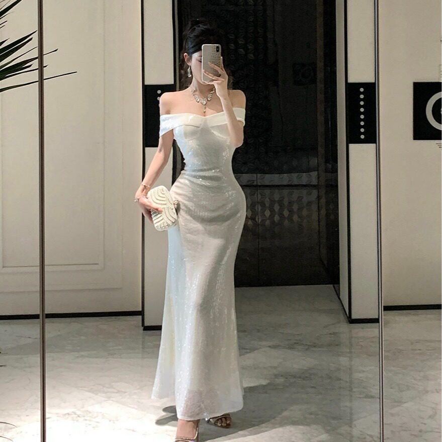 白色一字肩抹胸亮片礼服裙图片