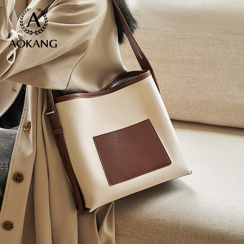 奥康托特包大容量通勤斜挎包