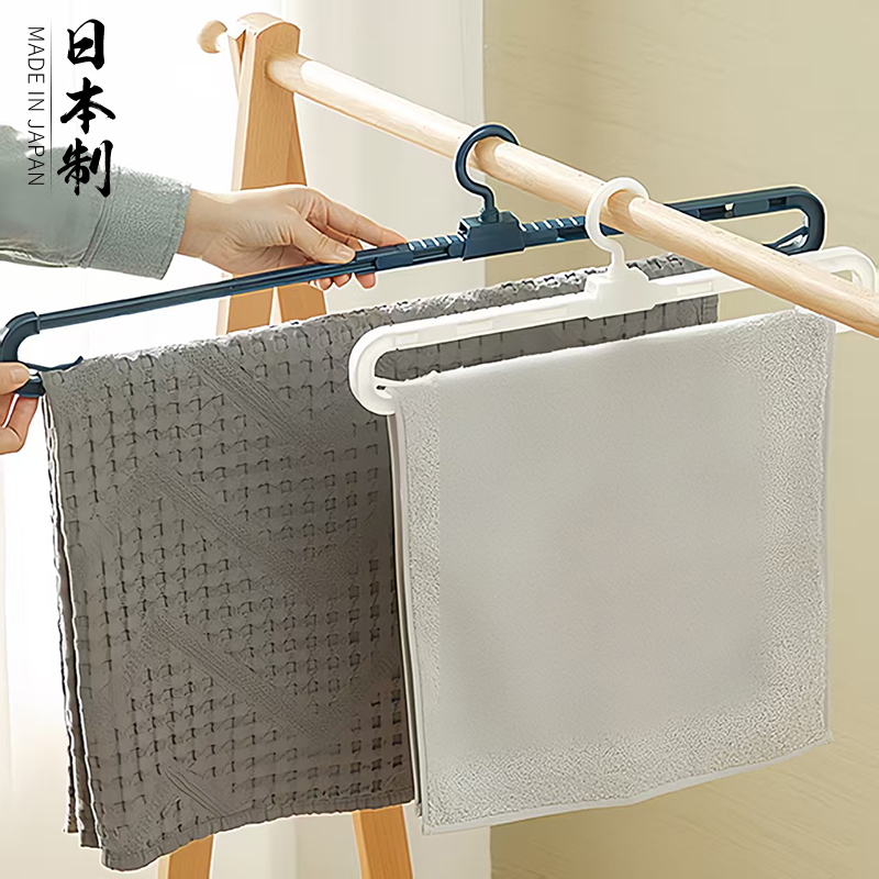 日本进口塑料伸缩床单加长衣架