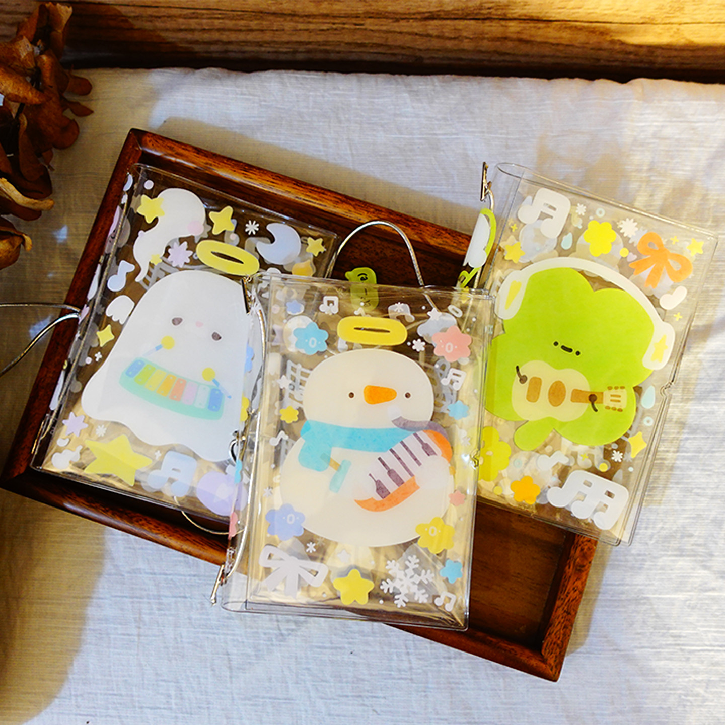 【TN护照壳】手帐护照本收纳 绑绳保护套 原创插画 四叶草雪人图片