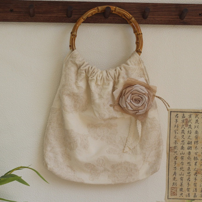 亚麻棉麻本色文艺风圆环竹节包