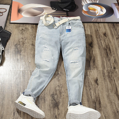 九分裤浅蓝色破洞小脚裤修身