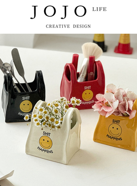 JOJO'S L. PD.unsmooth.个性手提袋桌面创意陶瓷笔筒遥控器| 柄涩