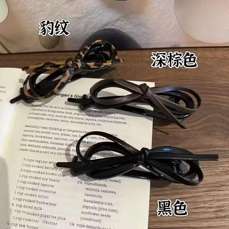【下單立減50】氣質(zhì)氣質(zhì)蝴蝶結(jié)扭扭夾女后腦勺盤發(fā)高級一字夾_WT