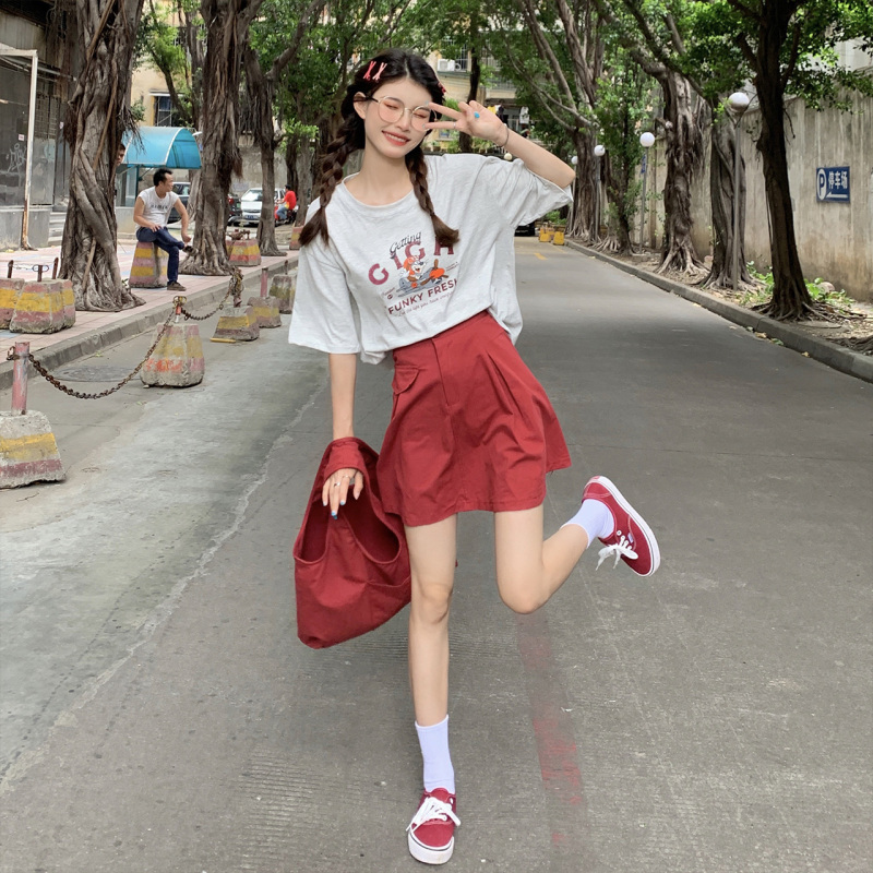 Real shot loose round neck short sleeve letter printed T-shirt + versatile A-line skirt + student canvas bag