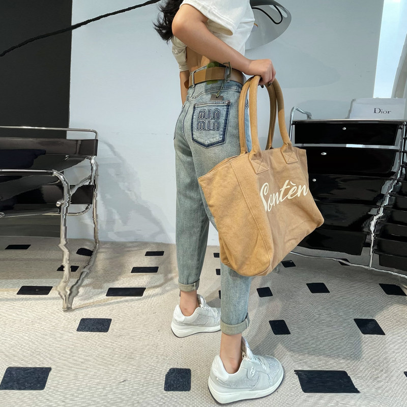 欧货春秋新款浅蓝色牛仔萝卜裤女宽松高腰显瘦大码休闲哈伦裤垮裤