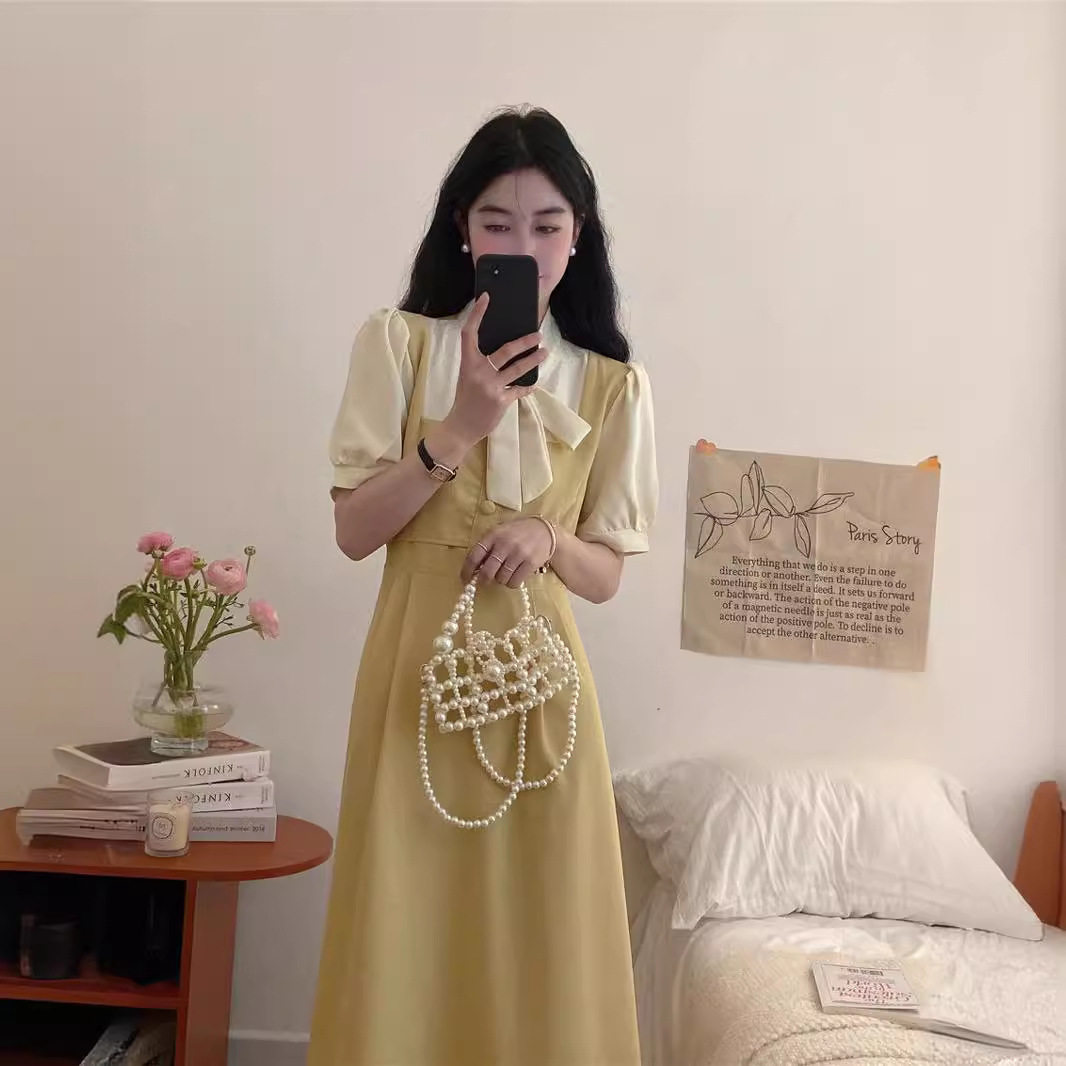 甜美学院风假两件连衣裙女夏季款设计感小众拼接chic蝴蝶结长裙子