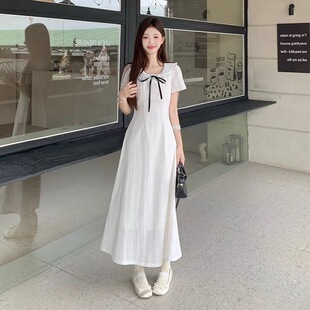 独特漂亮掐腰白色连衣裙子女装初夏穿搭2026新款今年流行爆款长裙