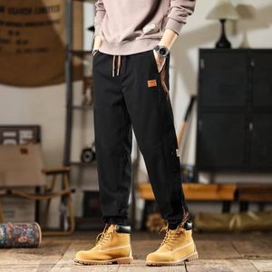1506-1/KK2431/P38春季男裤痞帅纯色修身小脚裤图片