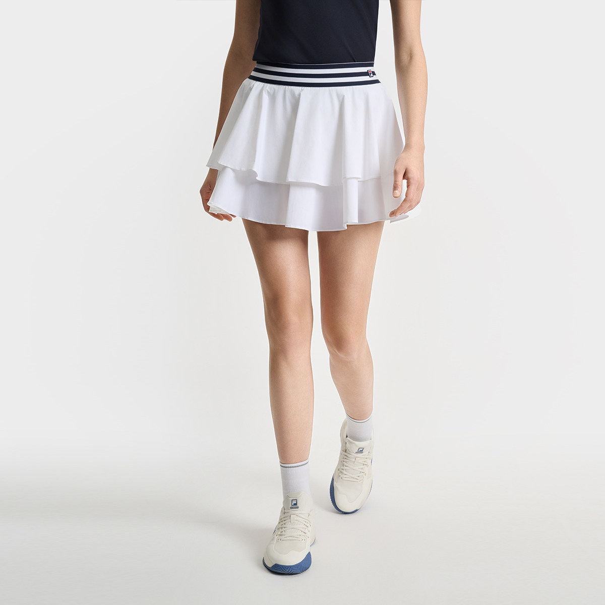 Fila/斐乐夏季新款女子户外时尚休闲场下网球半身裙A11W523302F