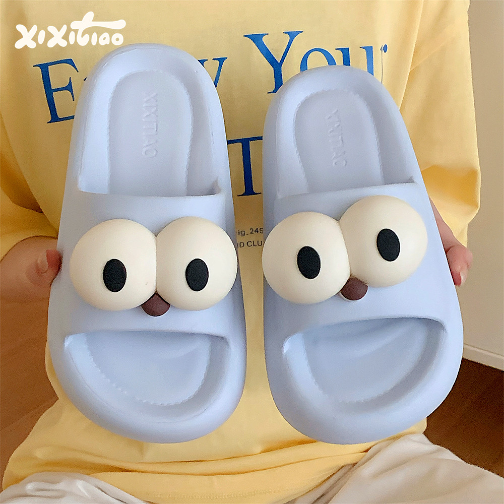 细细条搞怪大眼睛奶蓝色拖鞋