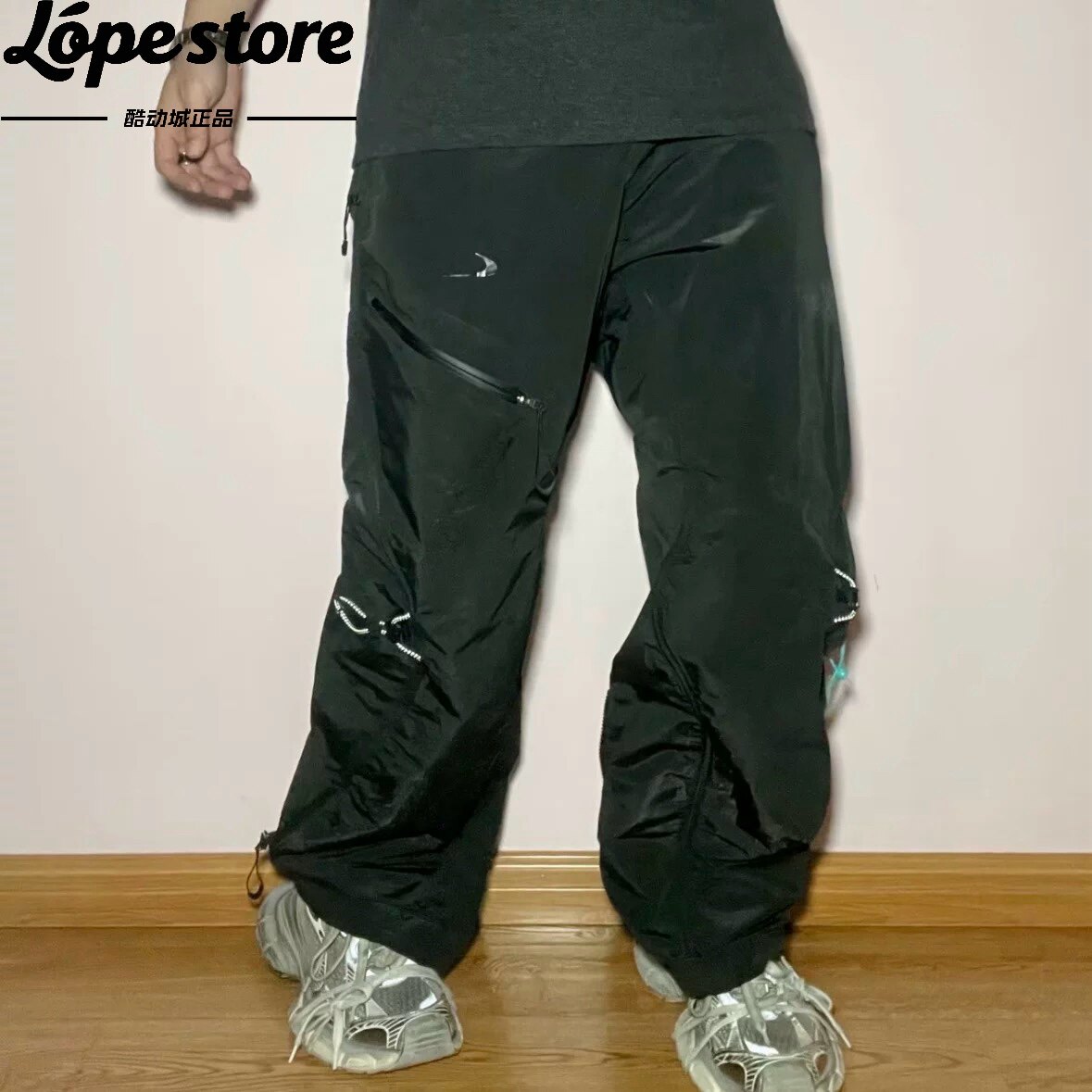 Nike/耐克 Off-White 男子联名机能梭织轻薄宽松软壳防水长裤