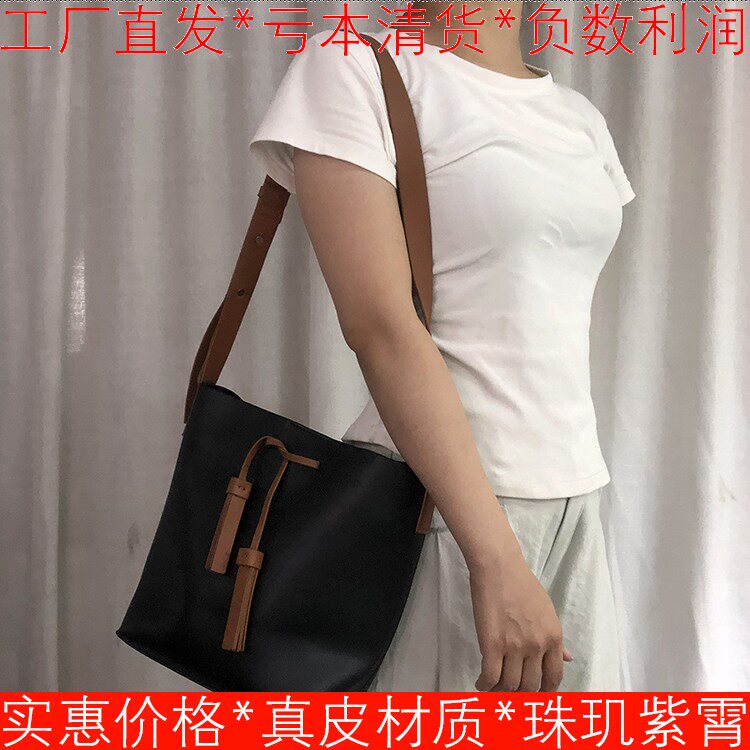 时尚包包女大容量黑色皮革流苏单肩斜跨水桶包百搭简约MD73210331