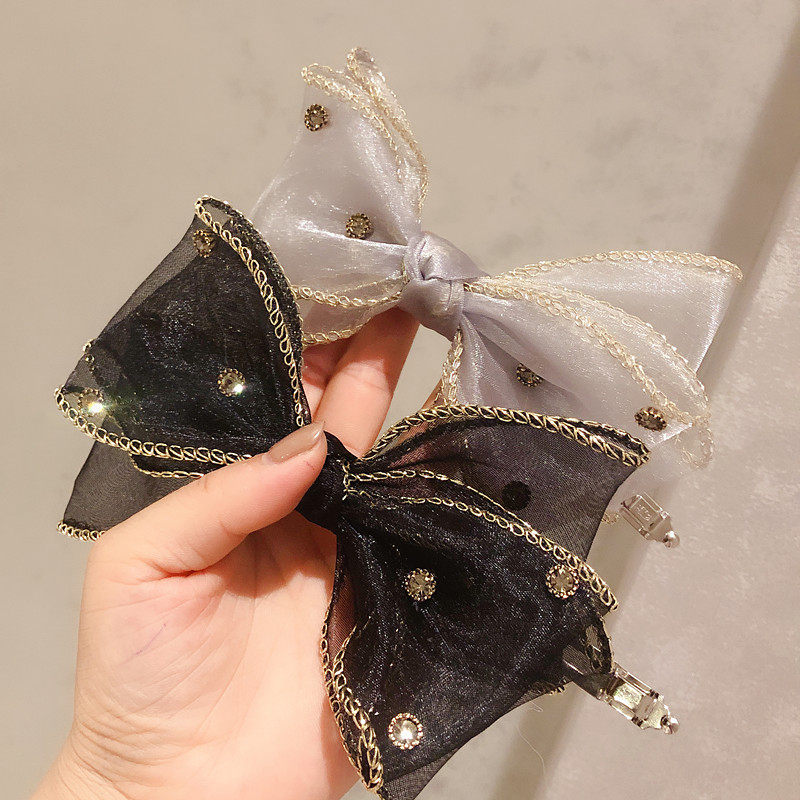 夏季新款蕾丝网纱带钻顶夹蝴蝶结发夹金属盘发顶夹女弹簧夹发饰品