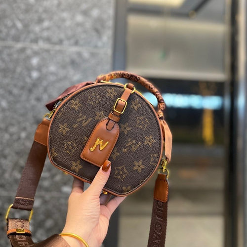圆饼女包优草坊斜挎高级感小众