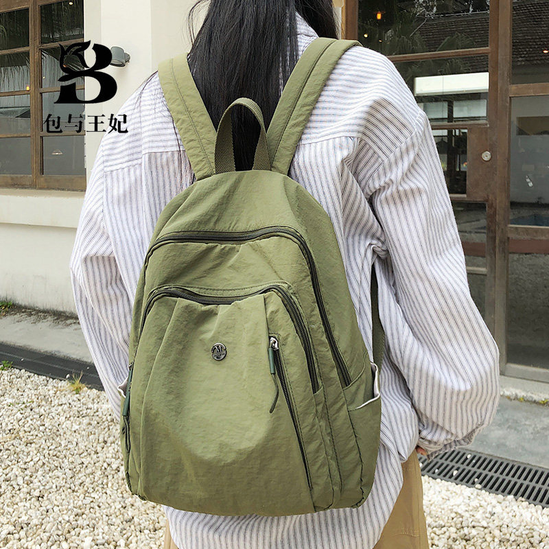 轻便防水尼龙布双肩包女2026夏季新款休闲百搭牛津布旅游背包男女