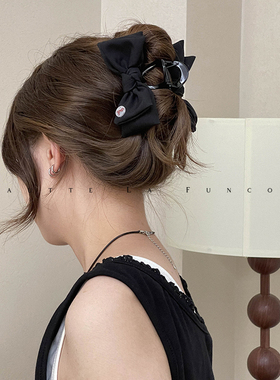 FUNCOCO｜条纹立体蝴蝶结抓夹高级感韩范鲨鱼夹气质百搭发抓发饰