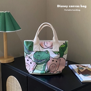 迪士尼正版 授权帆布包手提包卡通布艺女包可爱维尼抱抱龙通勤斜挎