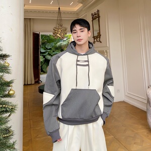 初春个性连帽套头男卫衣撞色毛呢垫肩韩版上衣皮衣137P145图片