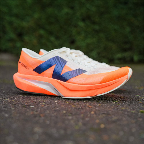代购New Balance FuelCell Rebel v4热芒果色日常训练轻量级跑鞋
