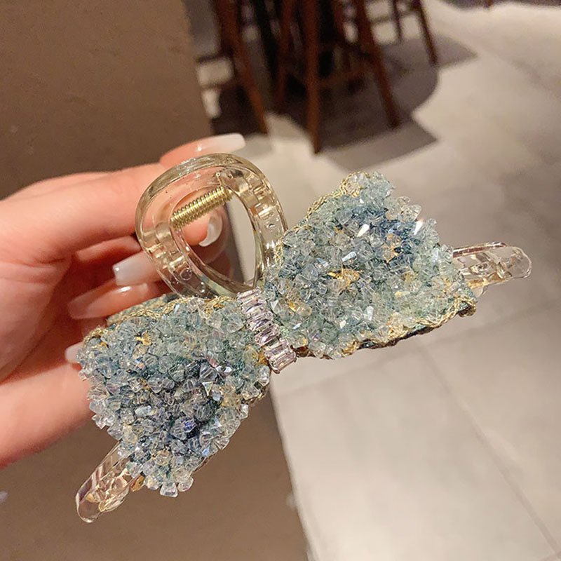 蓝色蝴蝶结水晶抓夹高级感