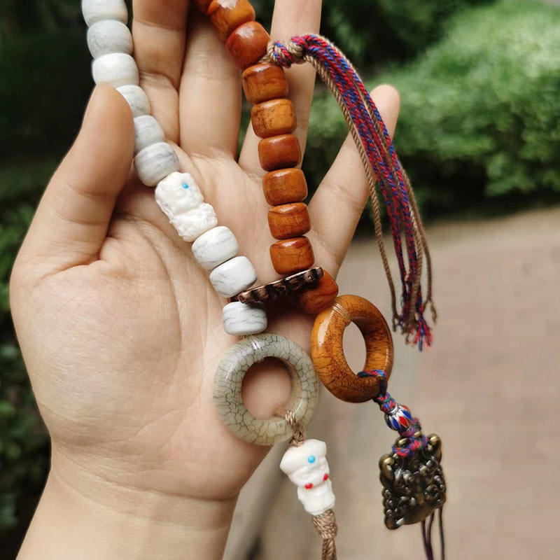 藏式牦牛骨回流炸裂纹手持10mm桶珠猫头鹰吊坠白料配饰民族风手串