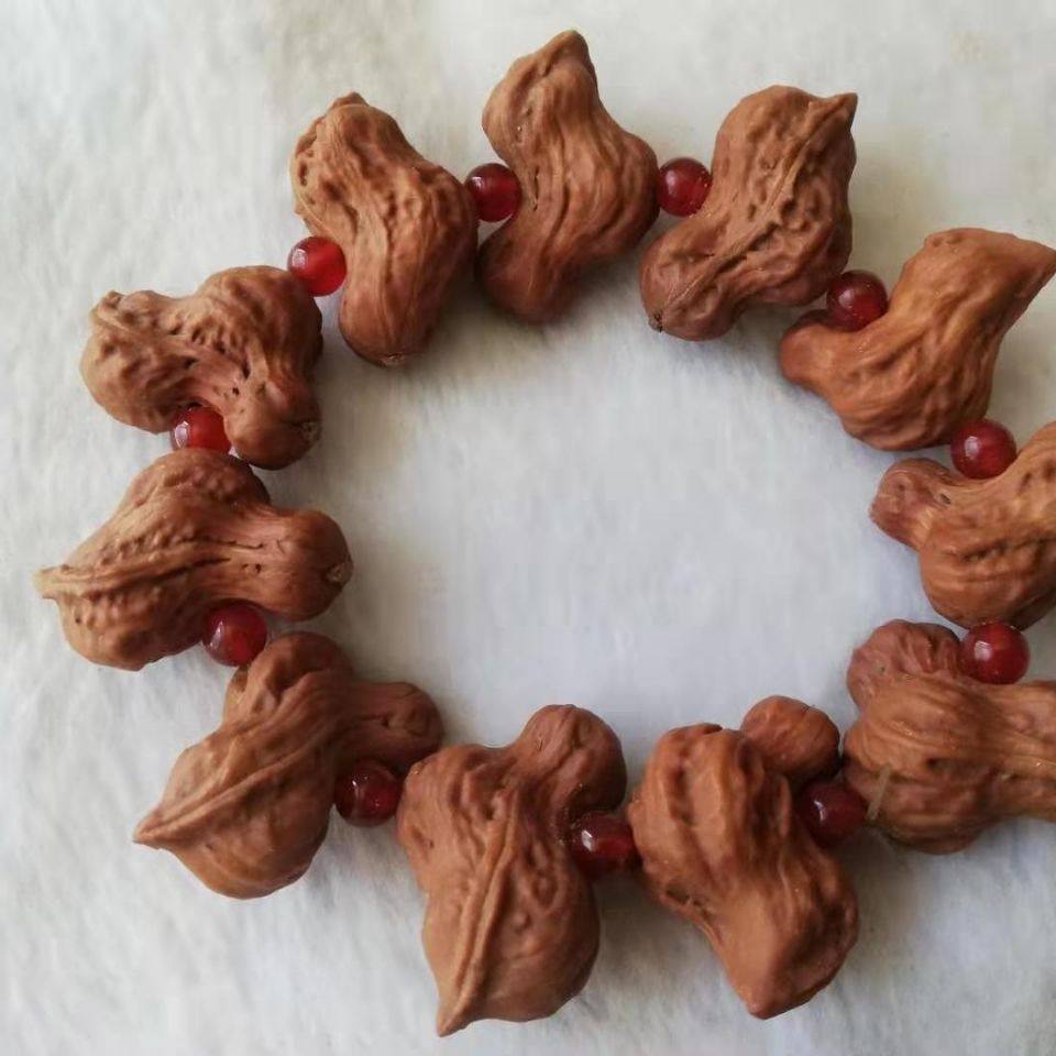 文玩核桃野生山核桃秋子异形小鸟手串手持手把件脖挂磨盘白狮子男