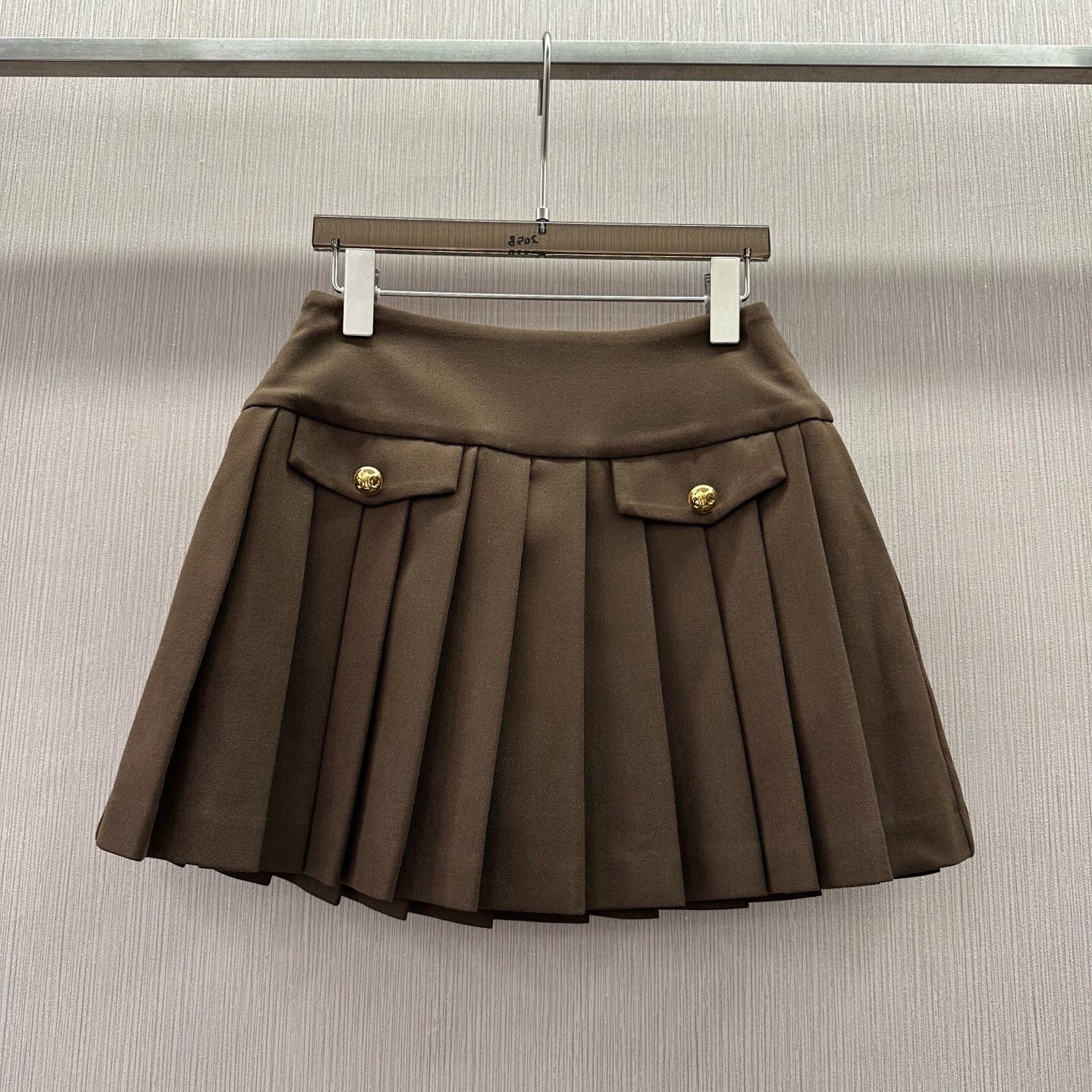 初溯2025秋冬新品欧货女金扣高腰显瘦百褶裙半身裙A字裙百搭短裙