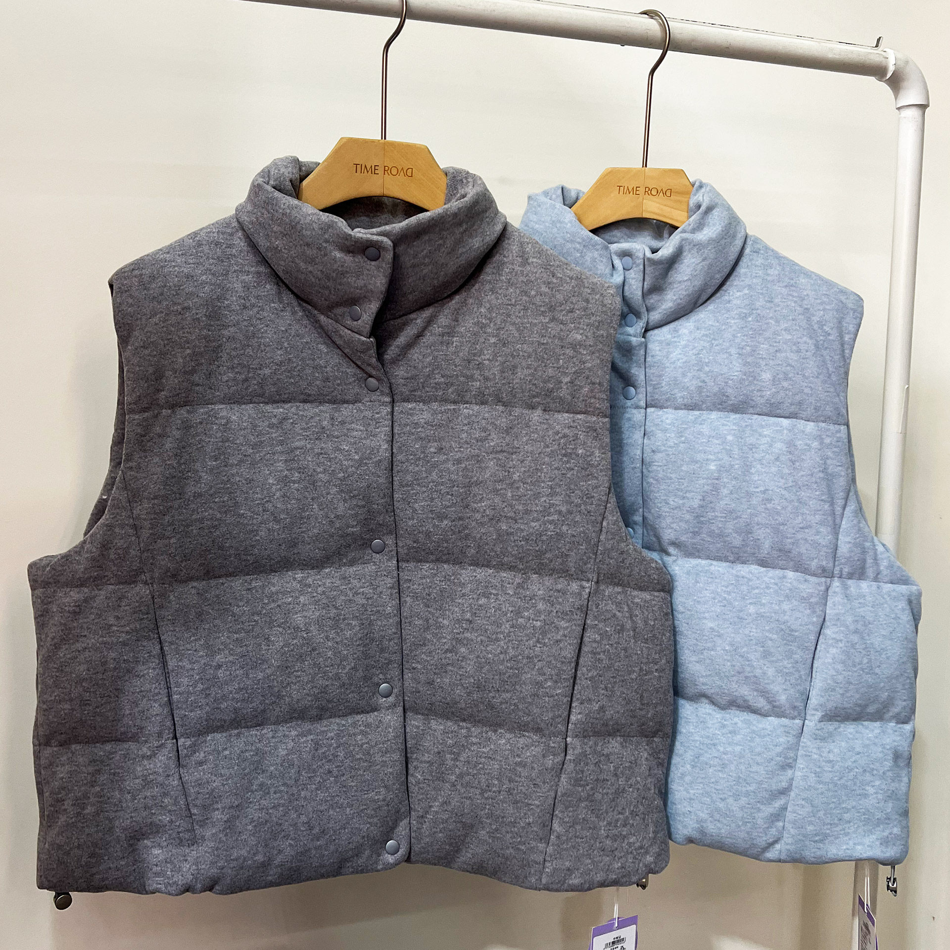 汤米诺休闲风羽绒马甲女