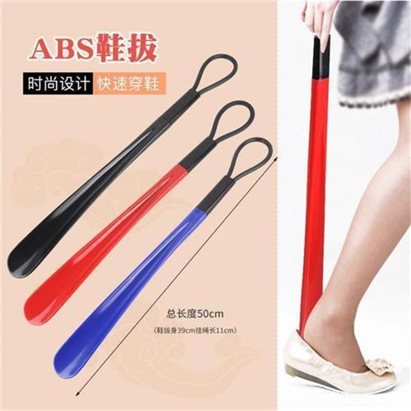 The lazy person wears shoe implement plastic shoehorn shoe