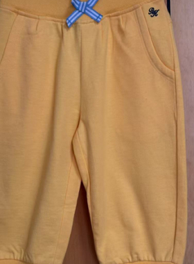 女童针织面料柔软黄色中长五分裤子51001