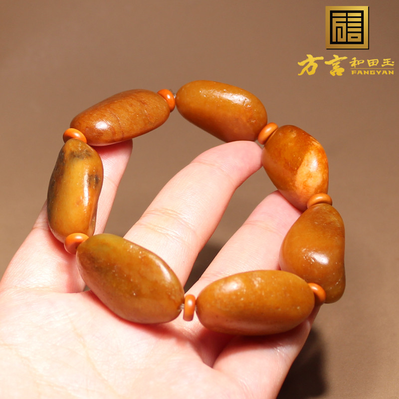轰动了方言和田玉精品特色新疆老熟黄沁皮黄玉籽料原石玩料手串A1