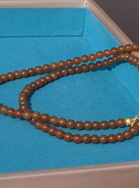 方言和田玉且细润末黄金糖玉手串