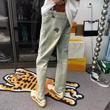 秋冬款印花图案牛仔裤男潮牌网红同款黄泥马直筒休闲小脚九分裤子
