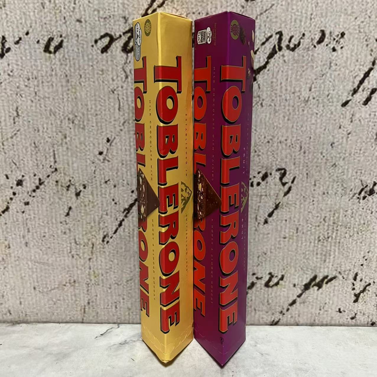 临期特卖 瑞士进口 牛奶巧克力制品含葡萄干蜂蜜及巴旦木糖100g
