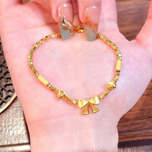古法黄金色在逃公主蝴蝶结手链女甜美轻奢猫眼小金珠不掉色手饰品