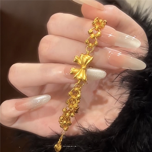 爆闪编制蹦迪珠双面蝴蝶结手链女999黄金色轻奢甜美在逃公主手饰