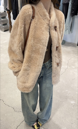 牛角扣全羊毛美利奴皮草外套羊羔毛一体廓形中长款女2025新款冬