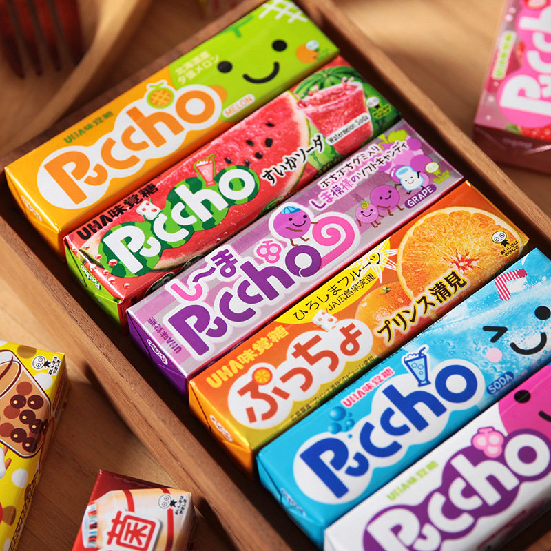 日本进口零食UHA悠哈普超水果夹心软糖条糖味觉糖葡萄可乐味50g