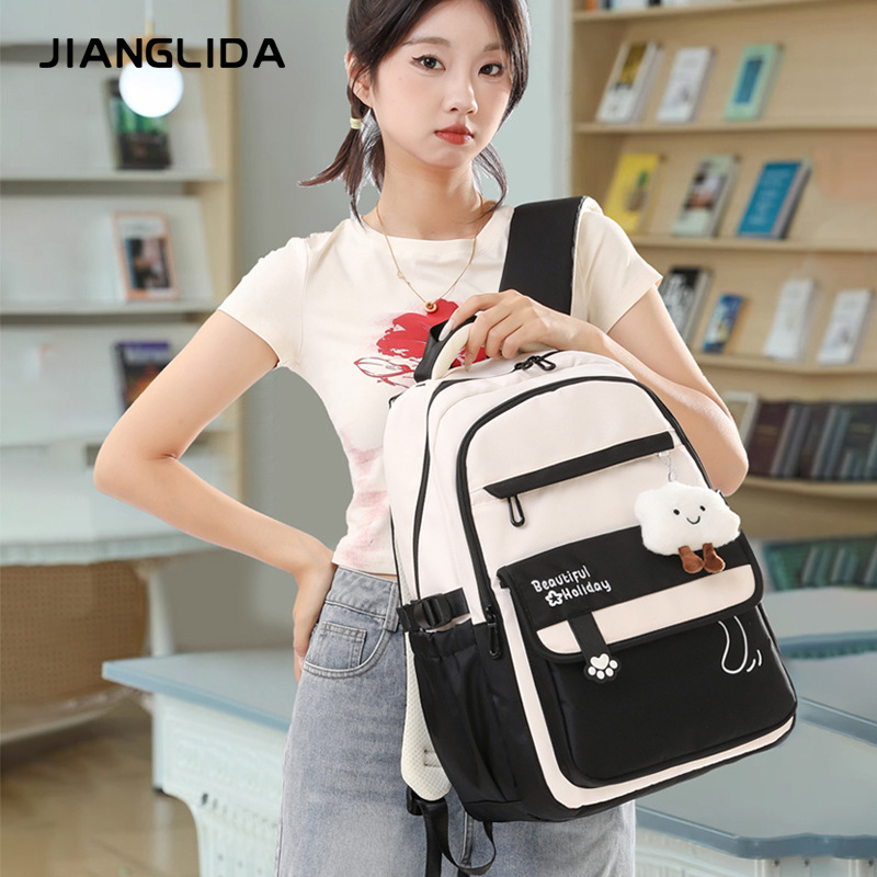 轻便书包女初中生新款小学生五六年级高颜值防水女孩减负双肩背包