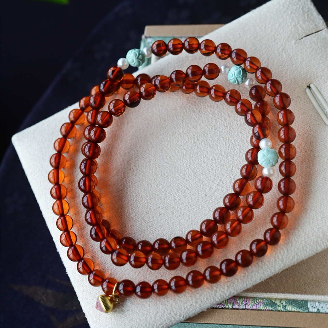 一斤钻戒 天然血珀108颗手链项链两用 珠子干净透亮 925银配饰