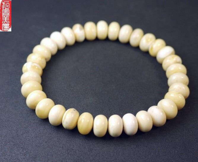天然琥珀吊坠珠波罗地海牙白花蜜蜡算盘形手链手串无烤色变黄了