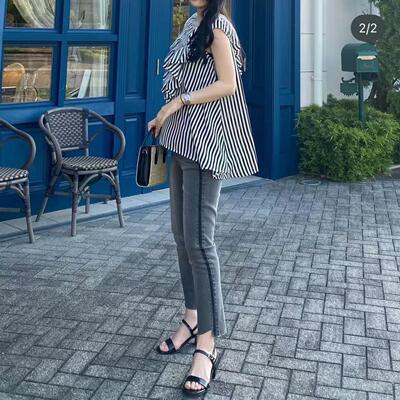 显身材一粒扣毛边小脚裤牛仔裤女