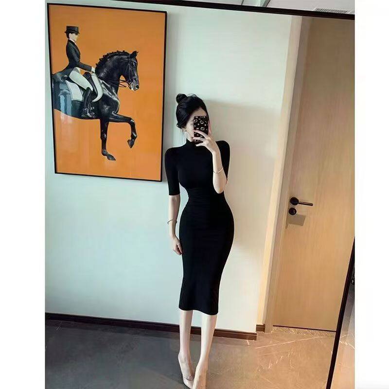 蜜糖松饼2026夏季纯欲半高领中袖后开叉连衣裙女春夏修身中长裙