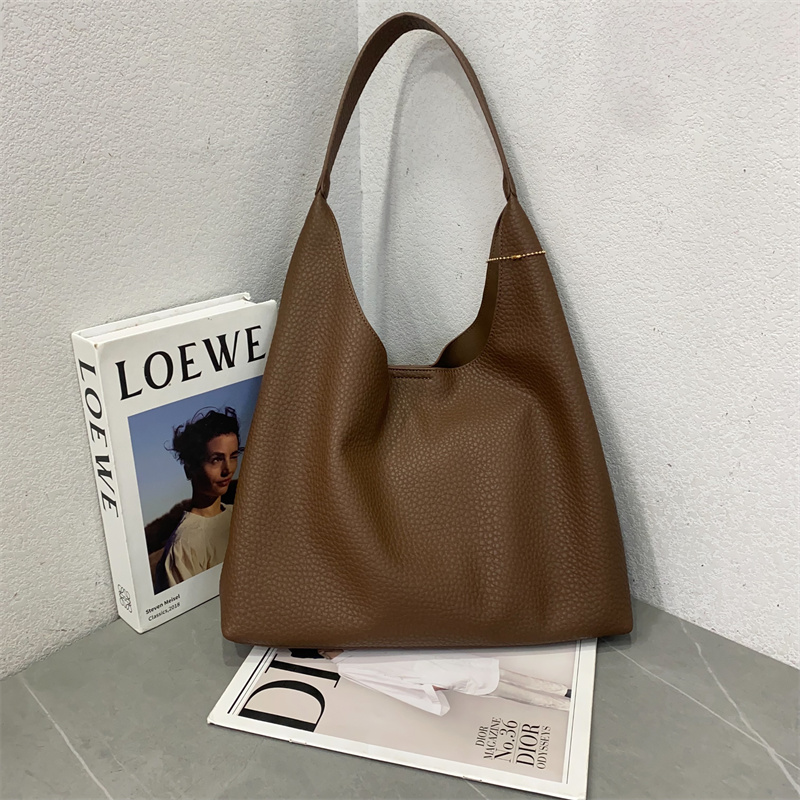 娜飞儿水桶包荔枝纹休闲腋下单肩